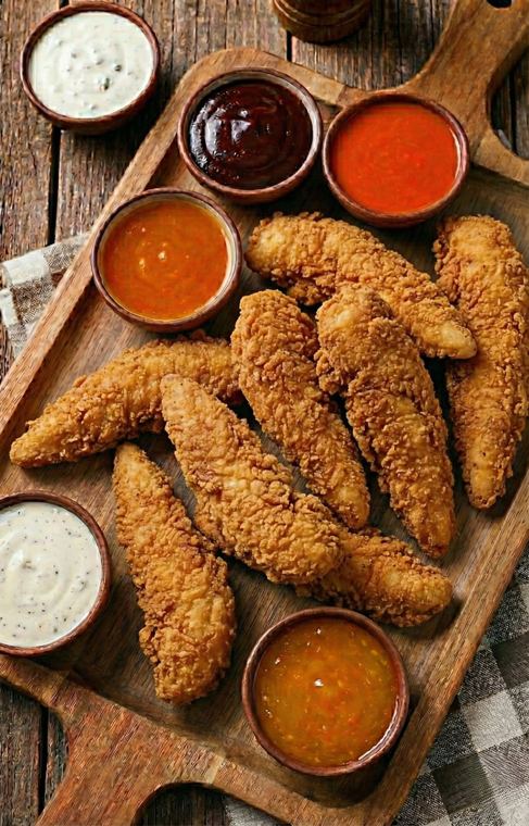 Hand-breaded crispy chicken tenders with Shark Sauce in Gary, IN